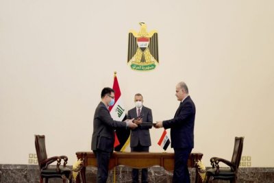 بغداد و پکن، 15 قرارداد برای ساخت 1000 مدرسه در عراق امضا کردند
